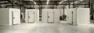Modular cold room installations with insulated panels and hinged doors
