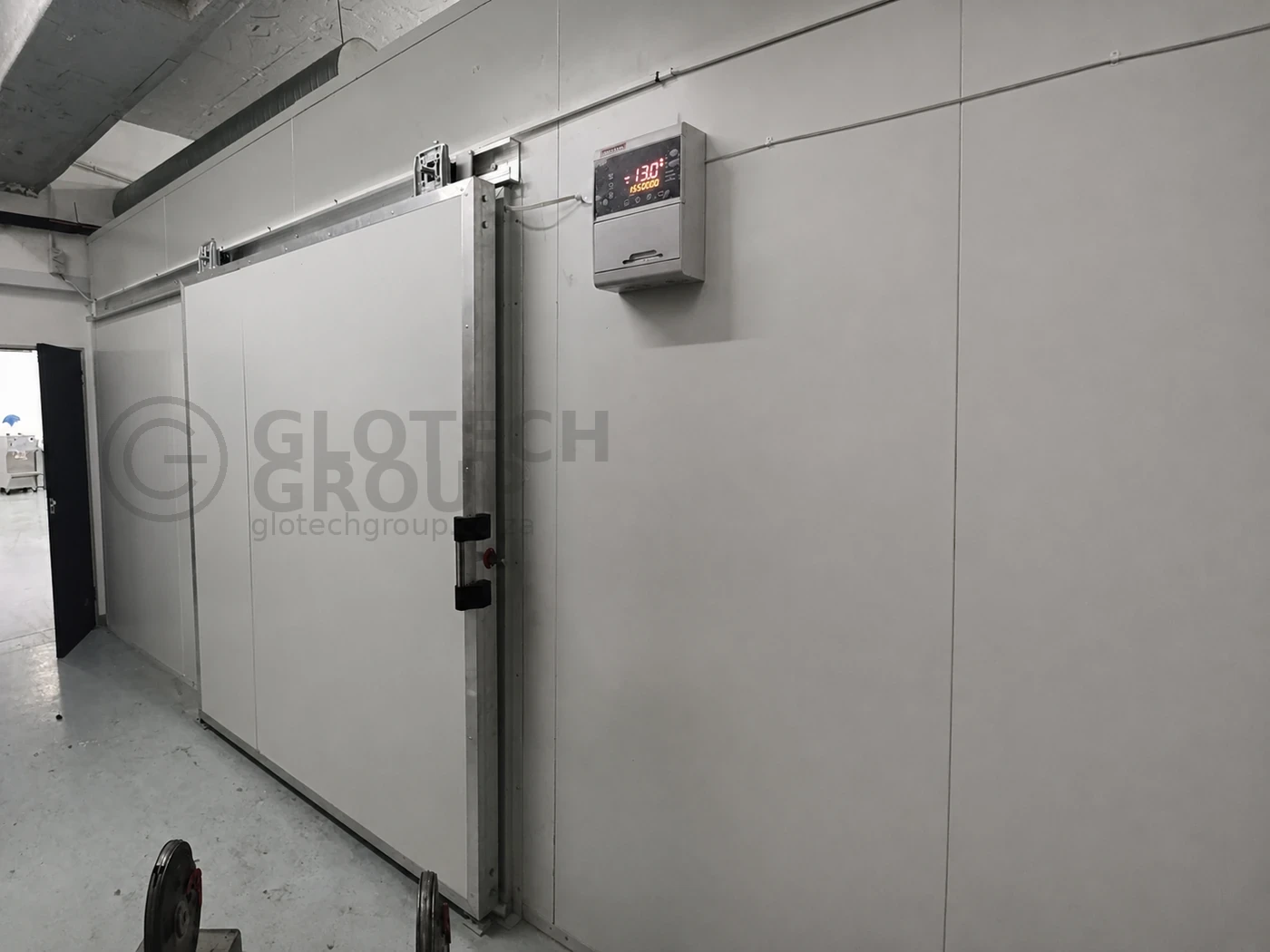 Sliding door installation for the Popco Ice Cream walk in freezer in Salt River