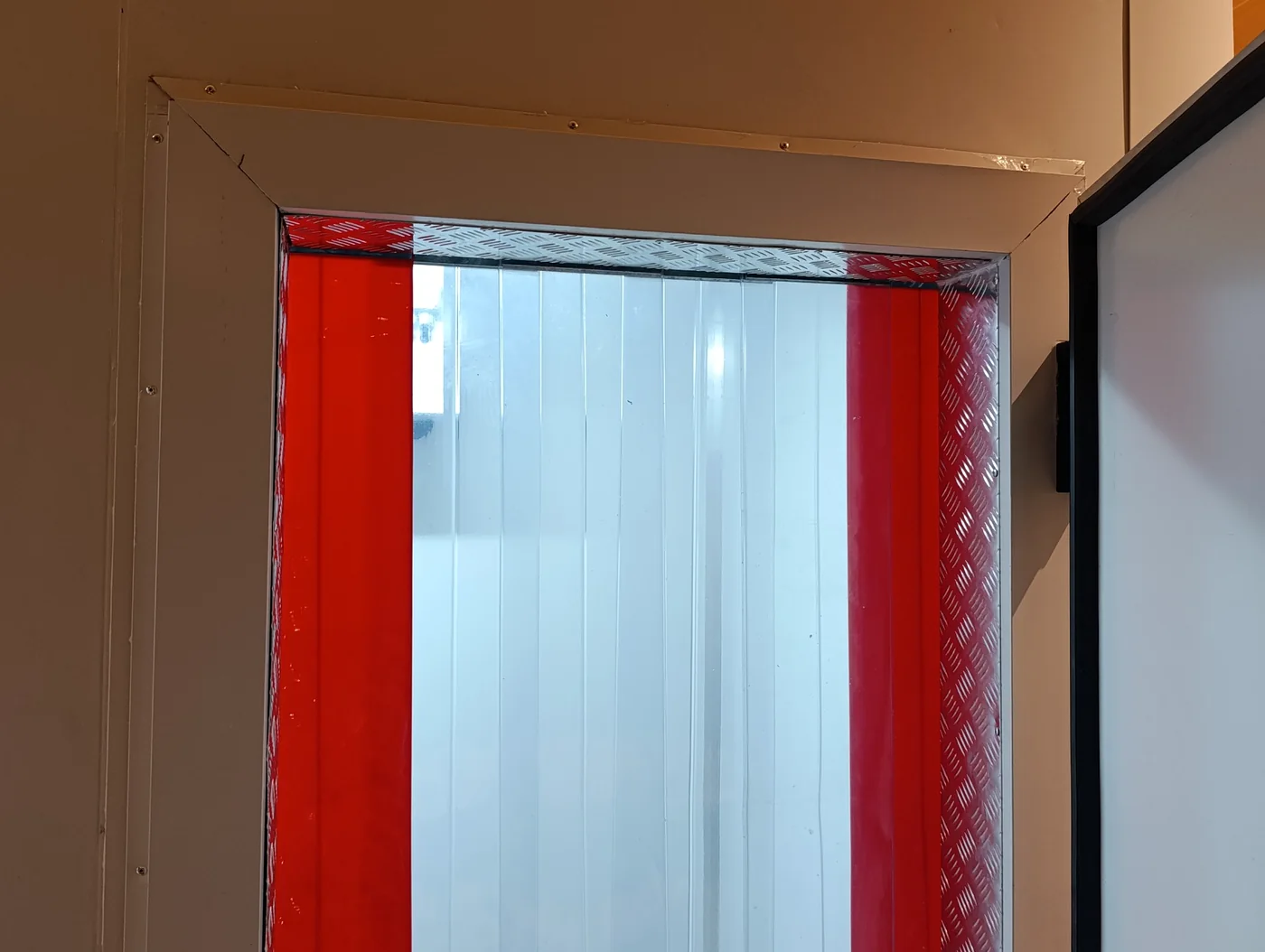 Red strip curtain installed at the Bin Rashied Kenilworth cold room entrance