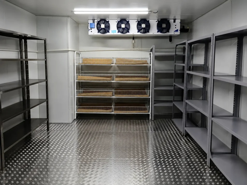 Completed insulated aluminium checker-plate floor inside Bruce Catering cold room in Paarden Eiland