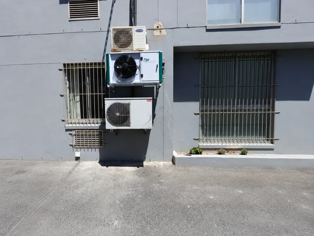 Outdoor refrigeration units serving the relocated cold room and freezer