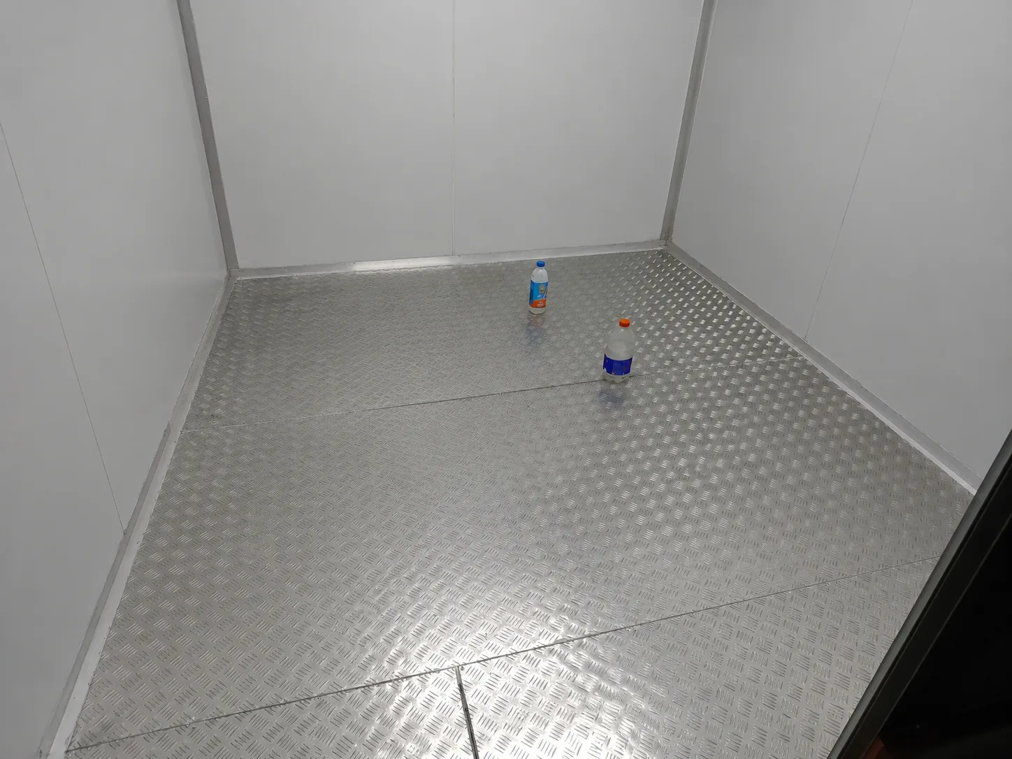 Insulated cold room interior with aluminium checker plate flooring