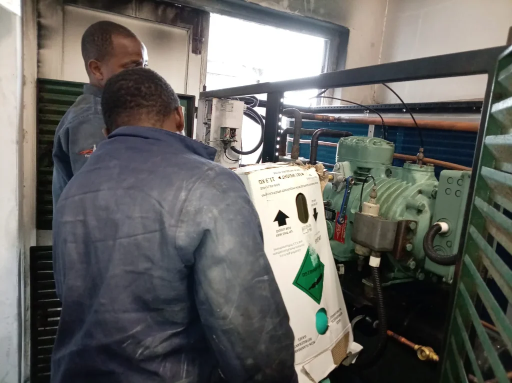 Technicians working on the condenser replacement project at Combined Abalone in Hermanus