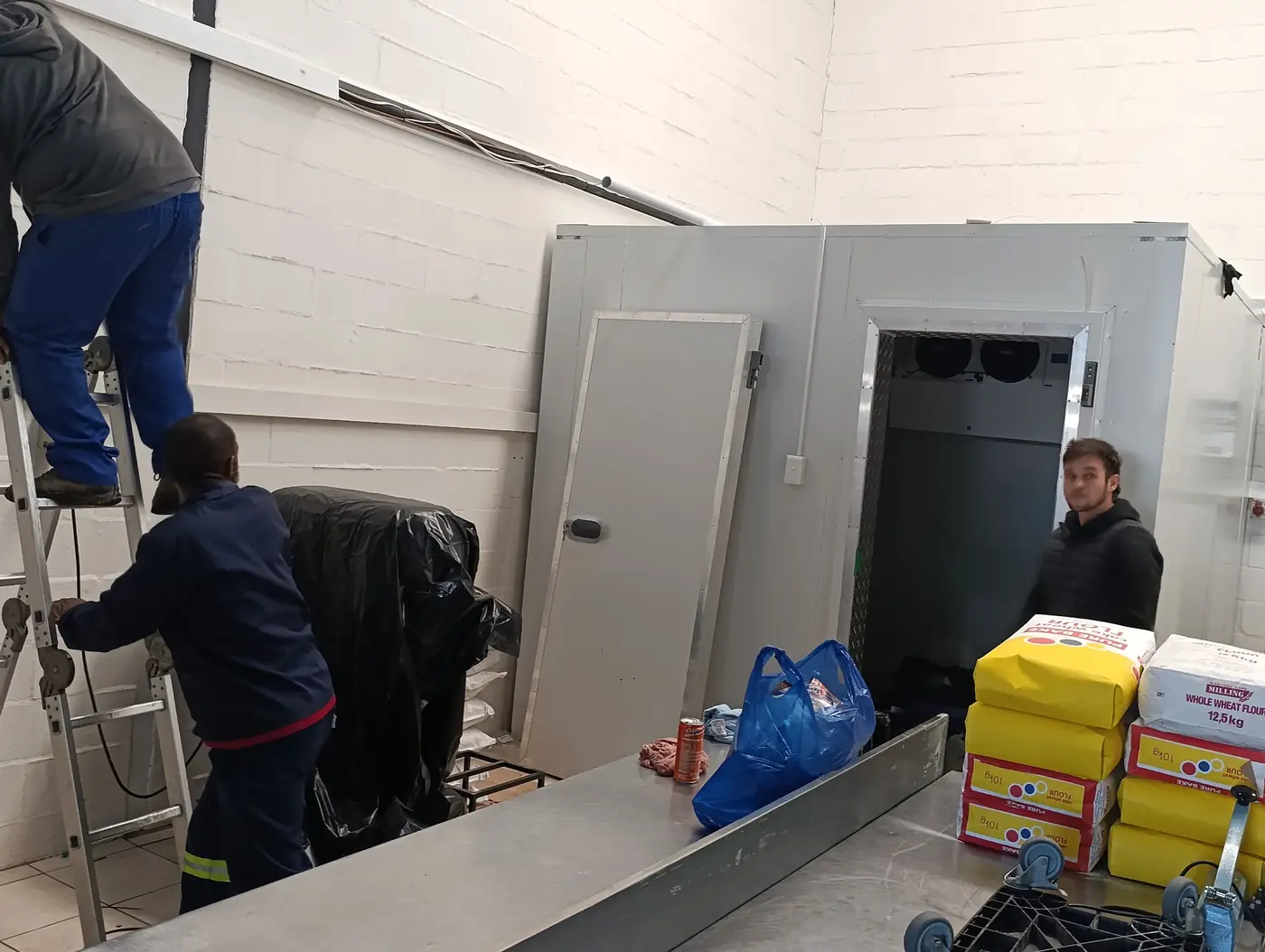 Installing electrical trunking and wiring for a commercial walk in freezer at Better Batters in Parow Industria.