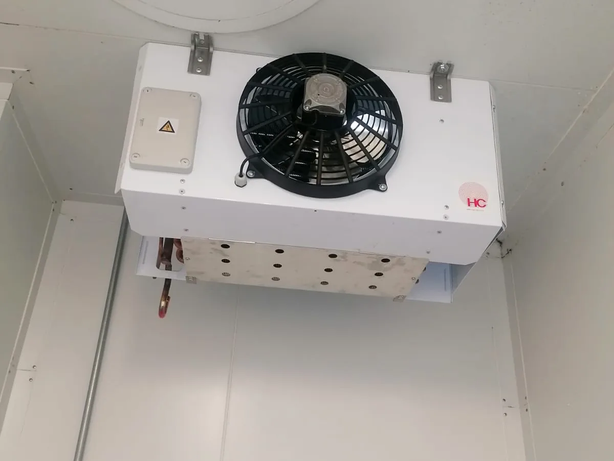 Single-fan cold room evaporator fitted above the doorway at Food Directions