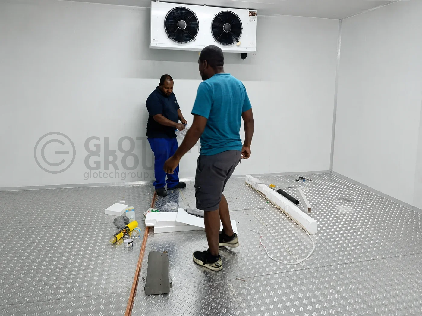 Technicians inspecting the Popco Ice Cream walk in freezer installation in Salt River