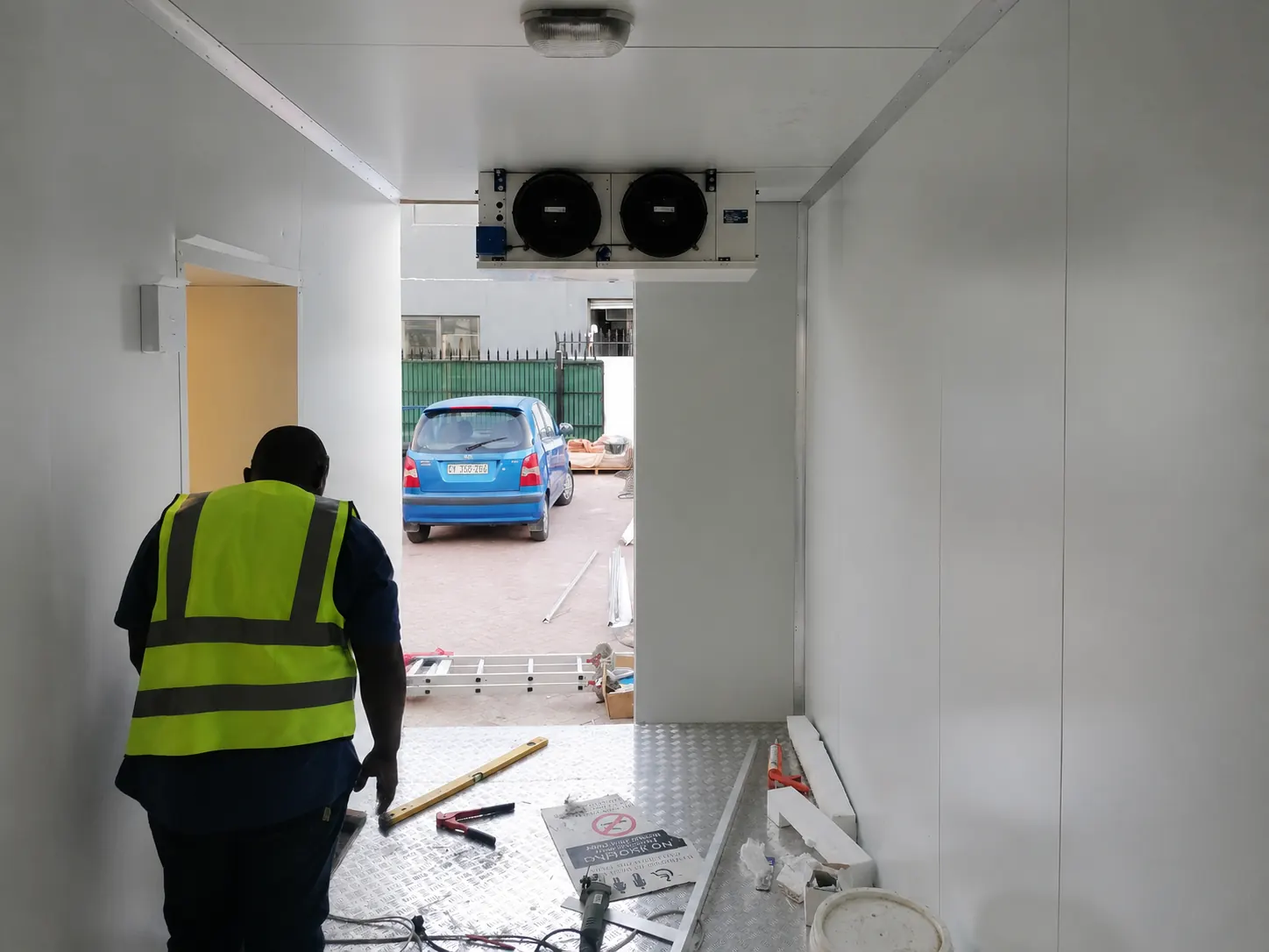 Technician completing the Chingadas Mexican Cantina cold room installation in Cape Town